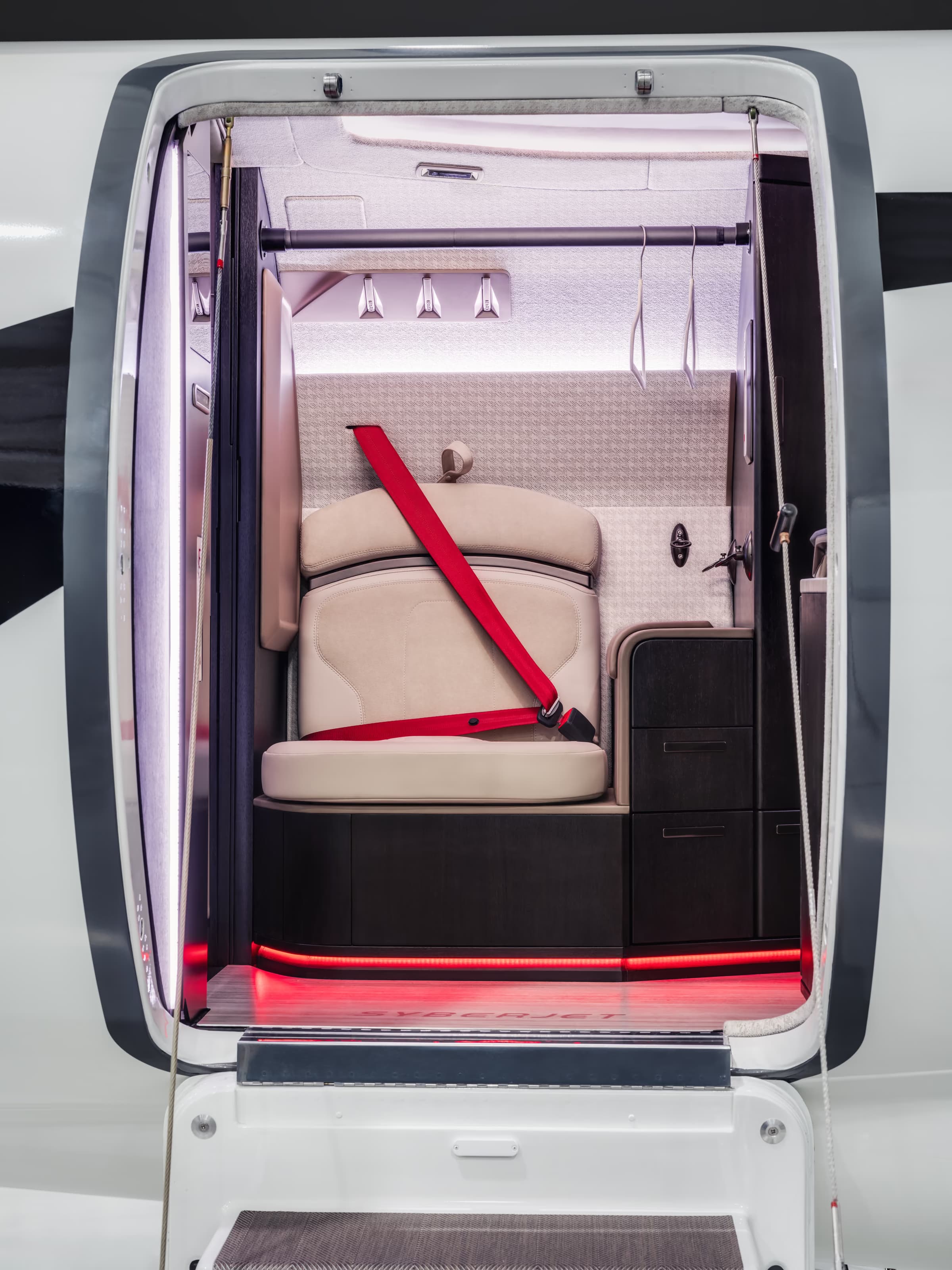 SJ36 entryway with a jump seat and coat hangers